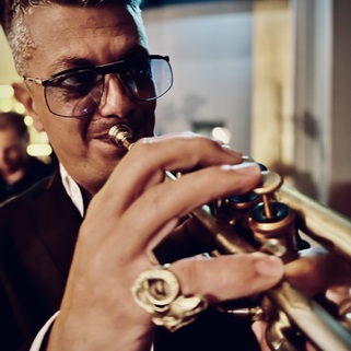 Pauli Wheeler performing with a DJ in Sydney